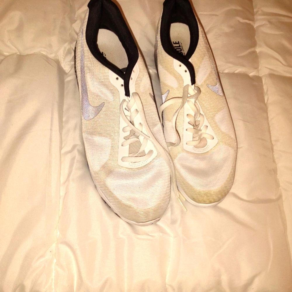 White reflector Nike shoes